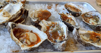  Grilled oysters in spicy chili butter are worth the trip to Finca in Paso Robles, California. Photo courtesy of Jim Farber. 