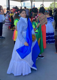  A woman from Argentina displays her flag at the 2022 Hispanic Heritage Festival in Greenville, South Carolina. Photo courtesy of Bill Neely. 
