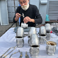  A local artisan works on mate cups at Feria de San Telmo Sunday market in Buenos Aires, Argentina. Photo courtesy of Margot Black. 