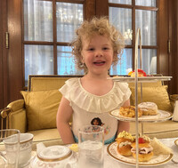 The author's granddaughter, Charlotte, enjoys a children's tea at the Willard InterContinental Hotel in Washington, D.C. Photo courtesy of Candyce H. Stapen.