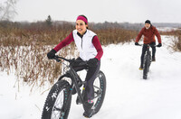  Fat-tire bicycling is one way to enjoy the snow for non-skiers. Photo courtesy of Lopolo/Dreamstime.com. 