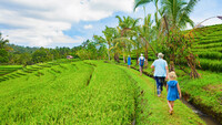  A family vacations together in Bali. Photo courtesy of Denis Moscvinov/Dreamstime.com. 