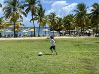  A child plays on the oceanfront sports court at the Buccaneer Beach and Golf Resort on St. Croix in the U.S. Virgin Islands. Photo courtesy of Candyce Stapen. 