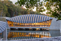 The Crystal Bridges Museum of American Art in Bentonville, Arkansas, is as spectacular for its architecture by Moshe Safdie as for its art collection. Photo courtesy of Chon Kit Leong/Dreamstime.com.