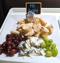 . Named after a local mountain, "Mt. Baldy" is a soft-blooming mold-ripened cheese aged with coconut ash at the Drake Family Farm in Ontario, California. Photo courtesy of Athena Lucero.