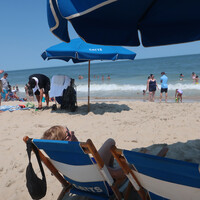  Relaxing in a beach chair at Rehoboth, Delaware, is allowed on a do-nothing vacation. Photo courtesy of Victor Block. 