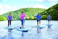  "Peddleboarding" is among the pastimes offered at the Lake Austin Spa Resort in the Texas Hill Country. Photo courtesy of the Lake Austin Spa Resort. 