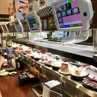 Sushi moves by on a conveyer belt at Kura Revolving Sushi Bar in Los Angeles, California. Photo courtesy of Margot Black. 