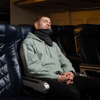 The bulk-free Trtl Travel Pillow has a unique design that prevents head-bobbing and supports your neck for relaxing napping on the go. Photo courtesy of Trtl.