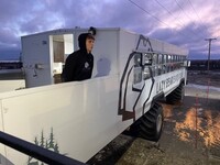  Deacon Daudrich prepares his family's Arctic Crawler for a day of polar bear encounters on the tundra outside Churchill, Manitoba, Canada. Photo courtesy of Lesley Frederikson. 