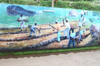  A roadside mural depicts life as it once was on Anegada in the British Virgin Islands. Photo courtesy of Victor Block. 