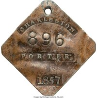  A "slave tag" made in Charleston, South Carolina, recalls the darkest days of U.S. history. Photo courtesy of Heritage Auctions. 