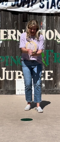 Brandi Montoya prepares to jump a frog at the 2024 Calaveras County Fair and Jumping Frog Jubilee in Calaveras County, California. Photo courtesy of Perry Montoya.