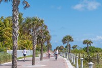 The wide Miami Beach Boardwalk welcomes both walkers and cyclists. Photo courtesy of Greater Miami and the Beaches. 