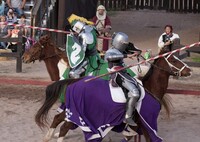 Jousters do battle in a medieval village at a Renaissance festival. Photo courtesy of Danny Raustadt/Dreamstime.com.