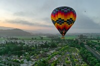  A daybreak hot-air balloon ride is one way to see Yountville, California. Photo courtesy of The Estate Yountville. 
