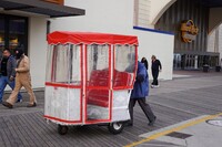 A rolling wicker chair with plastic curtains to protect from rain has long been a fixture on the boardwalk in Atlantic City, New Jersey. Photo courtesy of Alan Budman/Dreamstime.com.