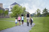 Children walk along a resort path with an equestrian trainer and Cupcake, the miniature</p>
<p>horse that welcomes guests to the Salamander Middleburg Resort in Virginia. Photo courtesy of Salamander Middleburg Resort.