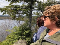  The author's mother and sister enjoy the view at the top of Honeymoon Bluff Trail overlooking Hungry Jack Lake near Grand Marais, Minnesota. Photo courtesy of Cheryl Thiede. 