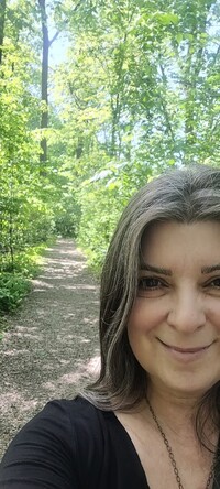  Author Carmen Zermeno enjoys a hike through Cristy Woods on the campus of Ball State University in Muncie, Indiana. Photo courtesy of Carmen Zermeno. 