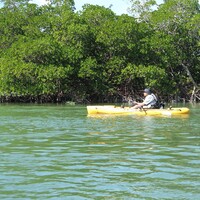 A fisherman plies the waters at the Rookery Bay National Estuarine Research Reserve in Naples, Florida. Photo courtesy of Victor Block.