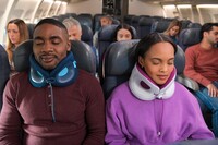  The Cabeau Evolution X adjustable travel pillow prevents head-bobbing that can awaken sleeping passengers. Photo courtesy of Cabeau. 