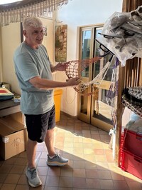  Paolo Archetti demonstrates making nets in Montisola, Italy. Photo courtesy of Alison Ramsey. 