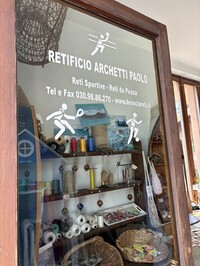  This peek into Retificio Archetti Paolo gives travelers another clue into the making of the region's famous nets. Photo courtesy of Alison Ramsey. 