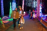  A family strolls through a Winter Wonderland at the Callaway Resort & Gardens in Pine Mountain, Georgia. Photo courtesy of Callaway Resorts. 