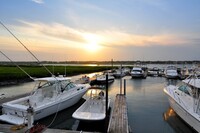 A sunrise walk around the marshes in Murrells Inlet, South Carolina, yields views such as this one of pleasure boats at anchor. Photo courtesy of Discover South Carolina.