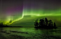  The Northern Lights dance in the night sky in Minnesota's Voyageurs National Park. Photo courtesy of Martha Shuff. 
