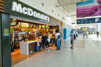 For travelers in a hurry, familiar fast-food outlets are still popular. Photo courtesy of Tea/Dreamstime.com.