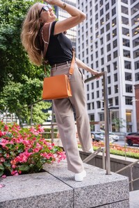  Thafael's Anti-theft Crossbody Bag is a supremely protective designer-looking chic purse that compactly carries all the essentials you need on the road. Photo courtesy of Thafael. 
