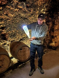  A tour of the limestone cellars at Bodegas Jesus Diaz e Hijos — excavated by Franciscan monks in the 16th century — includes a demonstration showing sediment during the wine fermentation process. Photo courtesy of Alison Ramsey. 