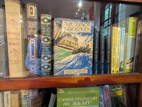  A bookcase at the James Norman Hall Museum in Tahiti displays Hall's personal copies of "Mutiny on the Bounty" and other books he coauthored with Charles Nordhoff. Photo courtesy of Athena Lucero. 