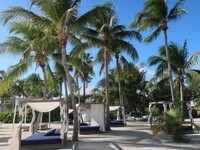  The chaise lounges at Kaibo Beach on Grand Cayman resemble comfortable beds. Photo courtesy of Victor Block. 