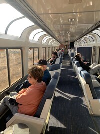  Amtrak passengers enjoy the views from the observation car during their 43-hour journey from Los Angeles to Chicago. Photo courtesy of Sharon Whitley Larsen. 