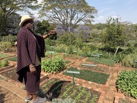  Martin Mollel shares the history and lush gardens of Gibbs Farm near Ngorongoro Crater in Tanzania. Photo courtesy of Lesley Frederikson. 