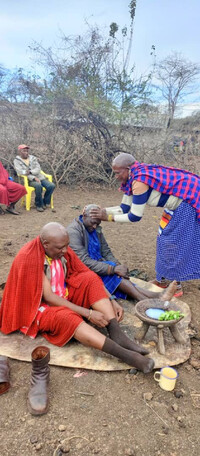 . Men receive blessings during an Irmegoliki ceremony in Tanzania. Photo courtesy of Martin Mollel. 