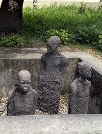  A haunting monument near the former slave market in Stone Town remembers the slaves who were once brutally traded there. Photo courtesy of Lesley Frederikson. 