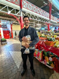 By 6 a.m., Chef Tereva Galopin of Le Sully French bistro in Papeete, Tahiti, has finished his shopping at the historic and bustling Sunday marketplace. Photo Courtesy of Athena Lucero.