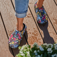 These easy-slip-on-and-off Bailey Molded Clogs by Totes are comfortable, waterproof and durably great for days spent on a waterside deck or strolling along a beach boardwalk. Photo courtesy of Totes.