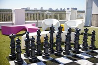 . Among the rooftop pleasures at the Effie Hotel in Sandestin, Florida, is playing a game of oversized chess. Photo courtesy of Hotel Effie Sandestin. 