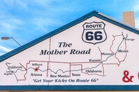  A motel along Route 66 sports a map of the highway on its facade. Photo courtesy of Matthieuclouis/Dreamstime.com. 
