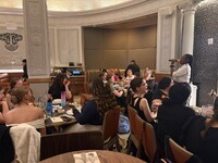  Gayle's Broadway Rose waitress Faith Jones serenades a dinner crowd inside the Hotel Edison. Photo courtesy of Alison Ramsey. 