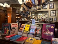  The Drama Book Shop in New York City's Theater District stocks musical songbooks, play and musical scripts along with behind-the-scenes-of-Broadway reads amid a fantastical installment of books spiraling across the ceiling and a visual explosion of pages into the back wall. Photo courtesy of Alison Ramsey. 