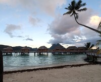Overwater huts in French Polynesia that date to ancient times are today the iconic symbol of French Polynesia. Photo courtesy of Athena Lucero.