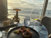  The Marine Room in La Jolla, California, offers exquisitely prepared food and unbeatable views. Photo courtesy of Georgeanne Brennan. 
