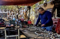 Ricardo Breceda works in his studio to create to create the metal sculptures that fill his roadside gallery in the Temecula Valley of Southern California. Photo courtesy of Jim Farber.