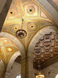 An elaborately designed pre-World War I bank in Montreal now houses a cafe and a work collective. Photo courtesy of Cheryl Thiede.